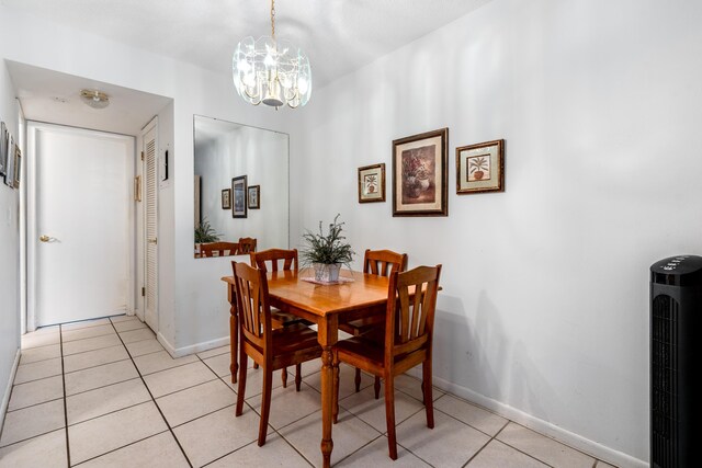 kitchen with white appliances, backsplash, sink, light tile patterned floors, and tile counters