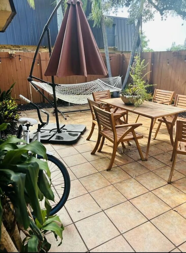 view of patio / terrace with fence