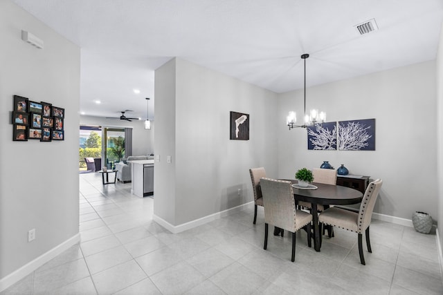 dining room with light tile patterned floors, recessed lighting, visible vents, baseboards, and ceiling fan with notable chandelier