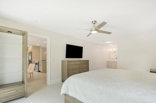 bedroom with ceiling fan and ensuite bathroom