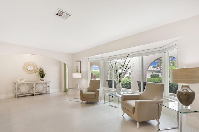 living area with light tile patterned floors