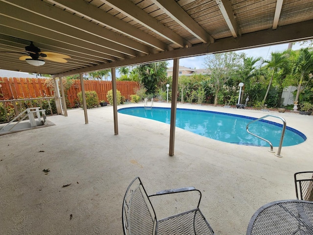 view of pool with ceiling fan and a patio area