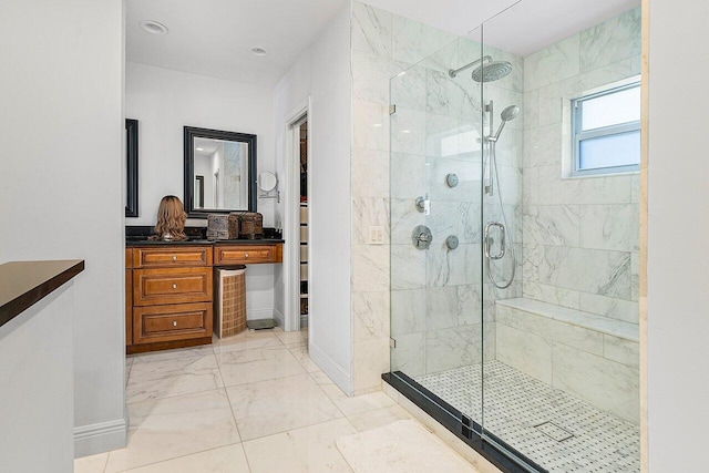 bathroom with vanity and an enclosed shower