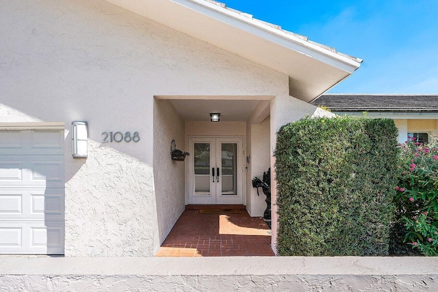 view of exterior entry with french doors