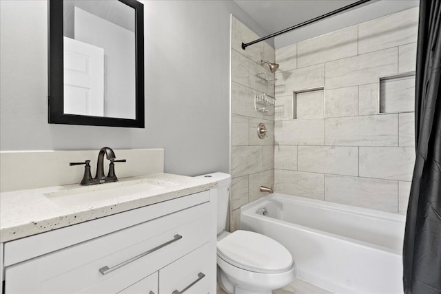 full bathroom featuring vanity, toilet, and shower / tub combo with curtain