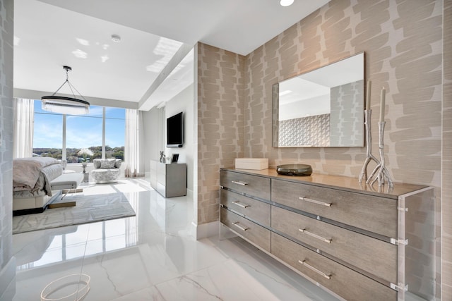 bedroom featuring a wall of windows