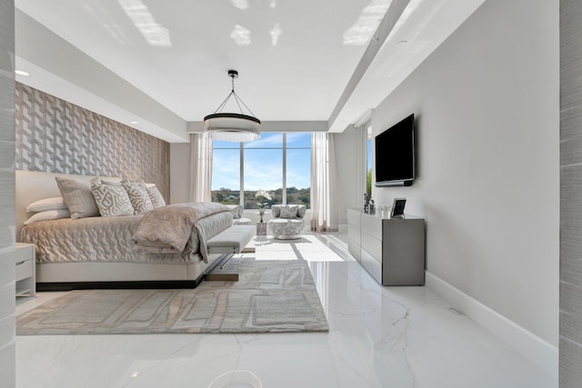 bedroom featuring a wall of windows