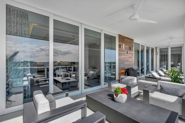 view of patio / terrace featuring ceiling fan and an outdoor hangout area