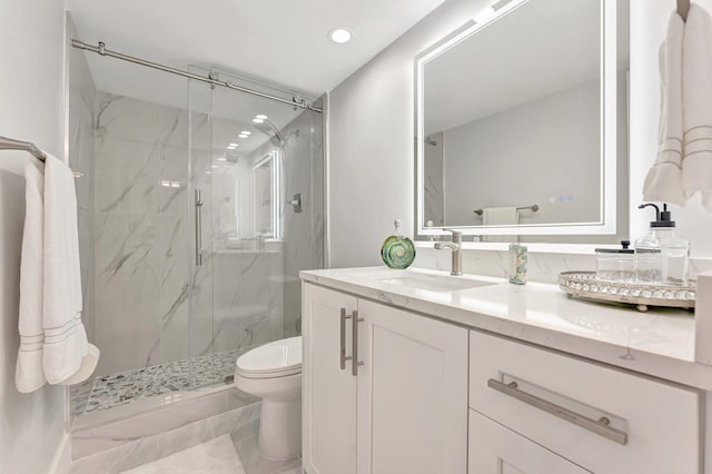 1180 S Ocean Blvd Unit 15B, Boca Raton, FL 33432 - full bath with toilet, a marble finish shower, vanity, and recessed lighting