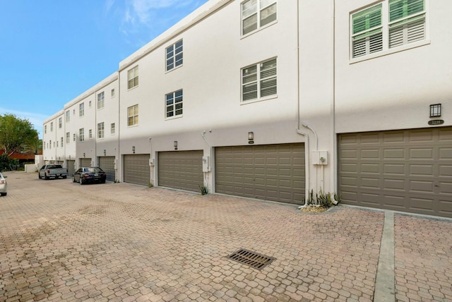 view of building exterior featuring a garage