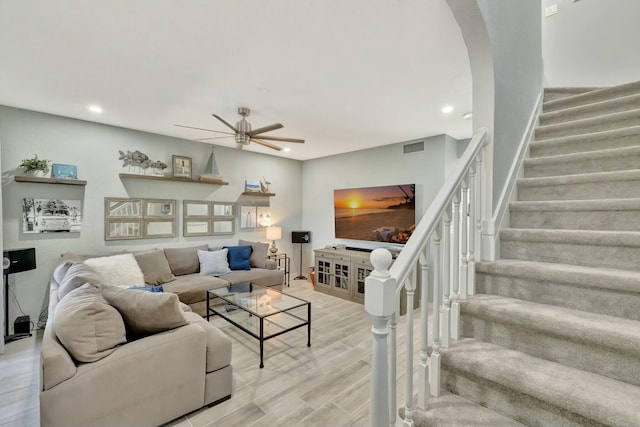 living room featuring ceiling fan