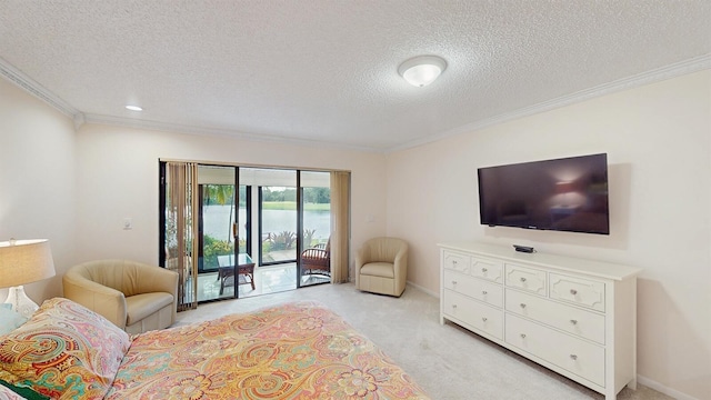 bedroom with access to outside, light colored carpet, ornamental molding, and a textured ceiling