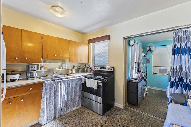 kitchen with cooling unit, sink, and stainless steel range with electric cooktop