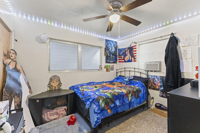 bedroom with ceiling fan and cooling unit