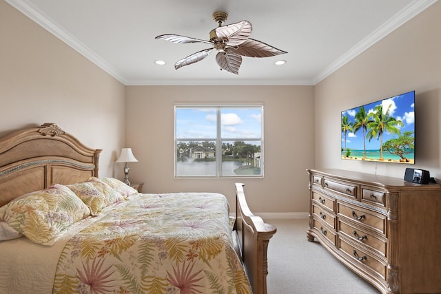 bedroom with ornamental molding, carpet, and ceiling fan