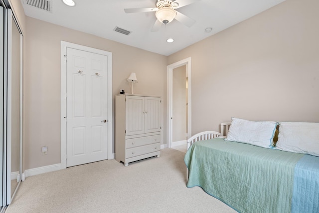 carpeted bedroom featuring ceiling fan