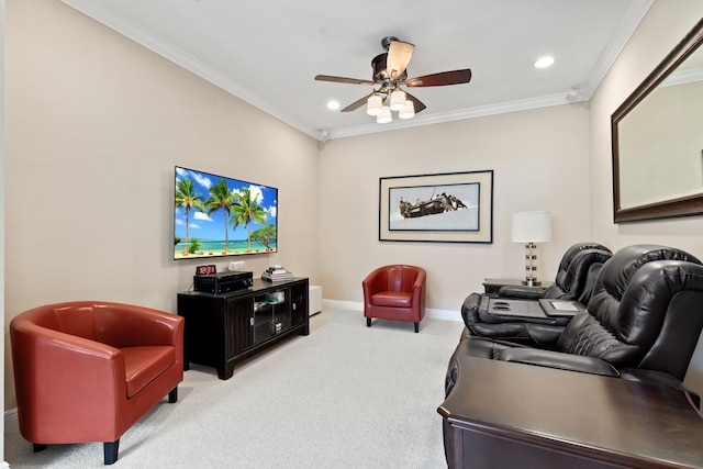 carpeted living room featuring ornamental molding and ceiling fan