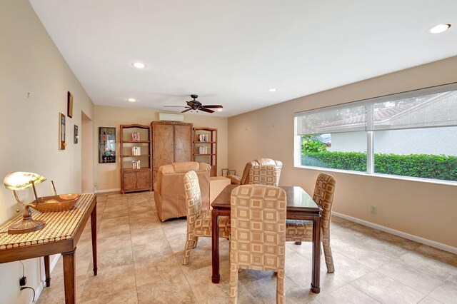 sitting room with ceiling fan and light tile patterned floors