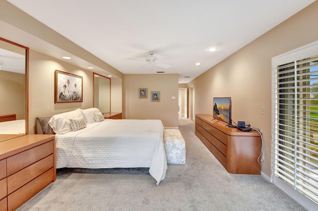 carpeted bedroom with ceiling fan