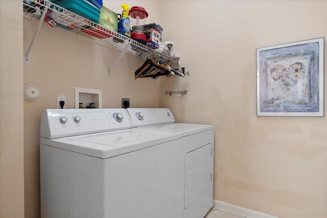 laundry room with washer and dryer