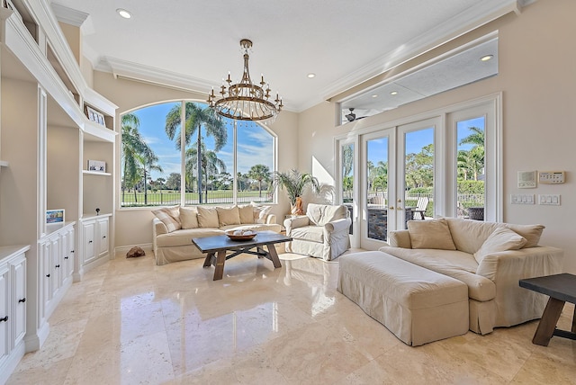 sunroom / solarium featuring french doors, plenty of natural light, and a chandelier