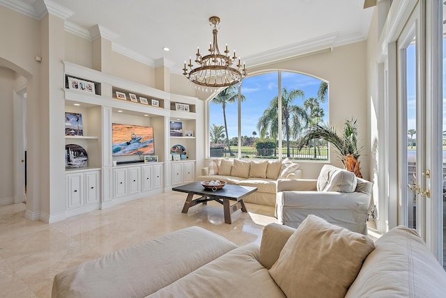 living room featuring a high ceiling, ornamental molding, built in features, and an inviting chandelier