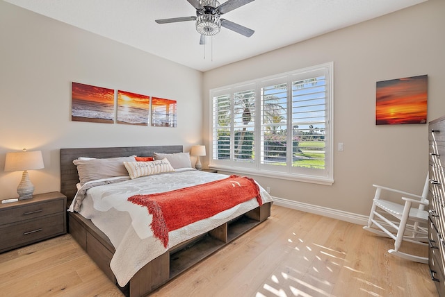 bedroom featuring ceiling fan and light hardwood / wood-style floors