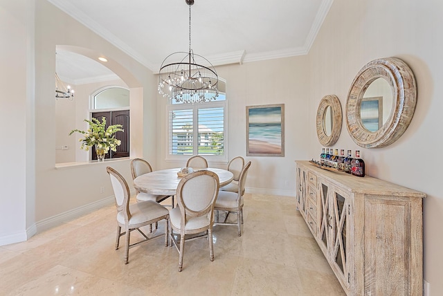 dining area with crown molding and a chandelier