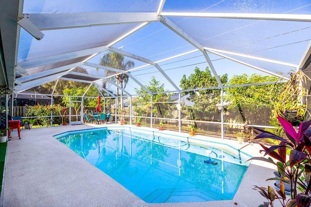 view of pool featuring a lanai and a patio area