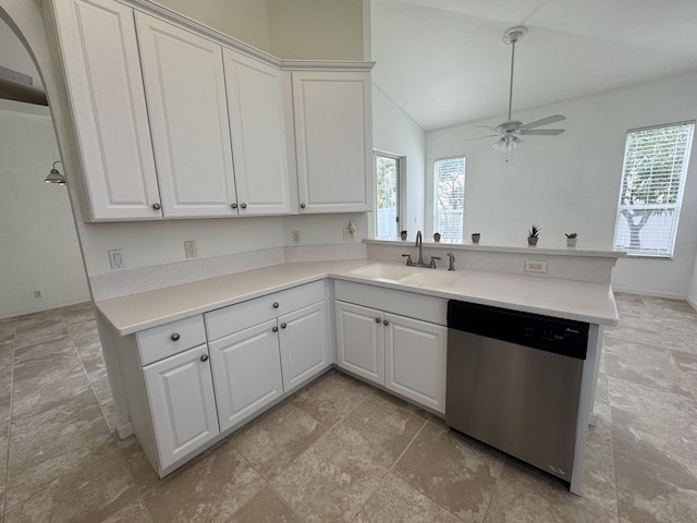 kitchen featuring dishwasher, white cabinets, plenty of natural light, and sink