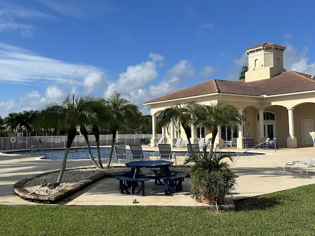 view of swimming pool featuring a patio