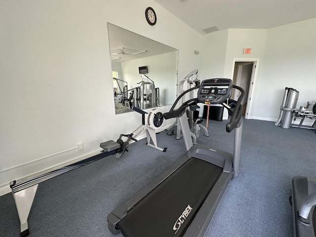 exercise room with ceiling fan