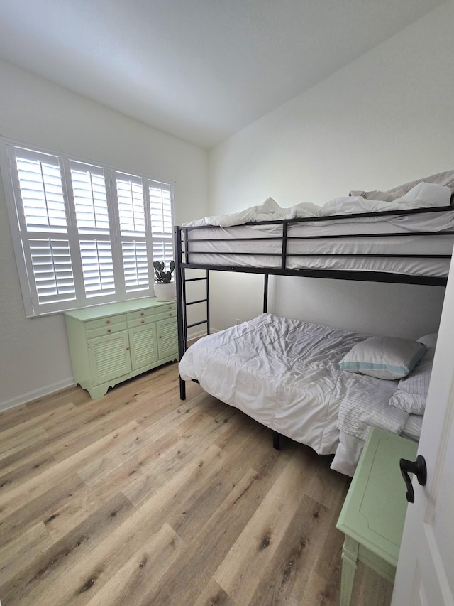 6001 Spring Lake Ter, Fort Pierce, FL 34951 - bedroom featuring light wood-type flooring