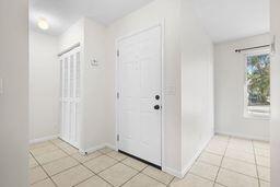 foyer with light tile patterned floors