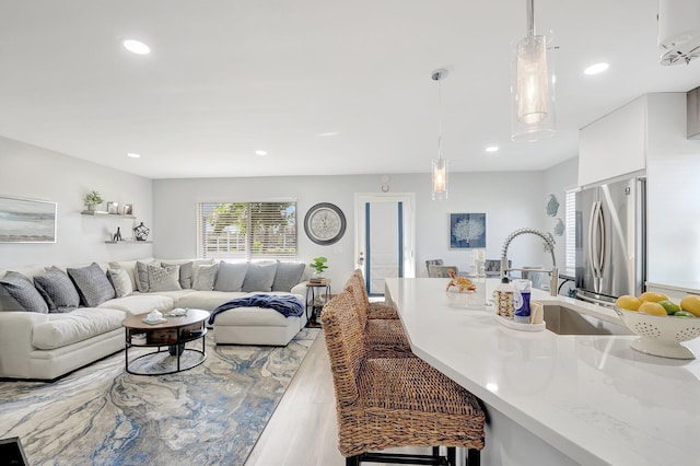 169 Flanders D, Delray Beach, FL 33484 - living room featuring wood finished floors and recessed lighting