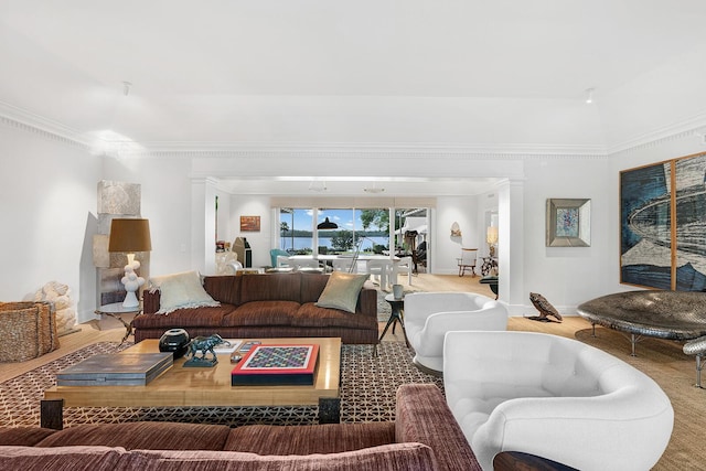 living room featuring crown molding