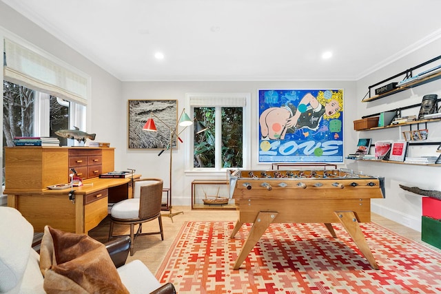 playroom featuring light wood-type flooring and ornamental molding