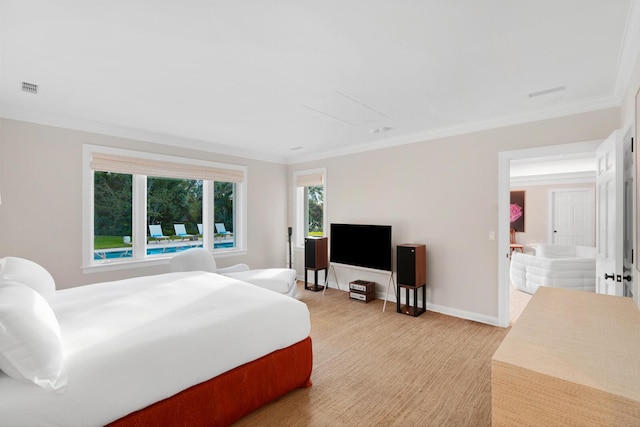 bedroom with ornamental molding