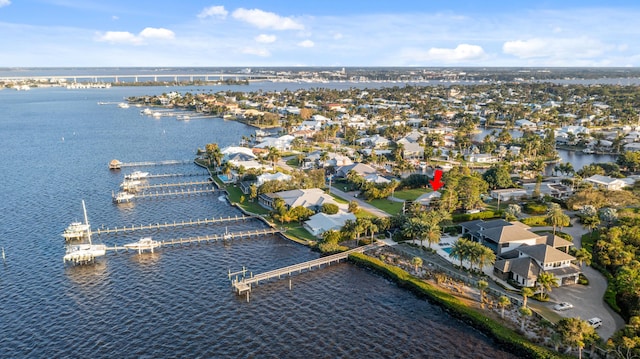 birds eye view of property featuring a water view