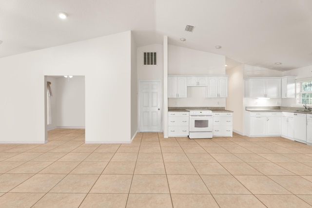 kitchen featuring white cabinetry, white appliances, light tile patterned floors, and vaulted ceiling