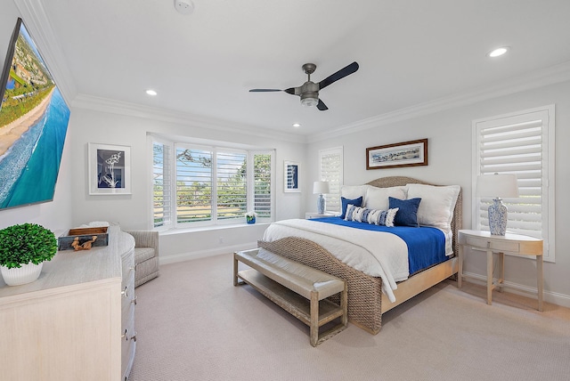 bedroom with ceiling fan, light carpet, and crown molding