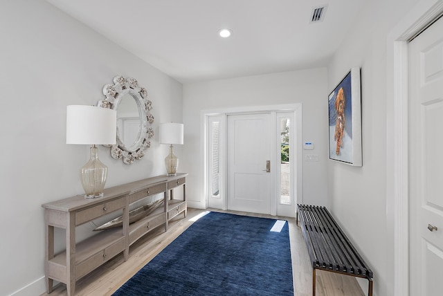 entryway featuring hardwood / wood-style flooring