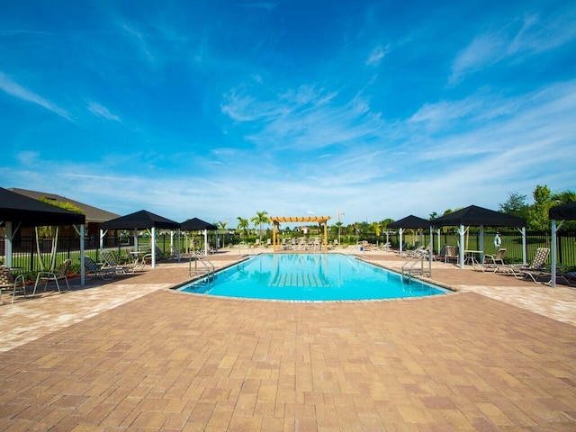 view of pool with a gazebo and a patio