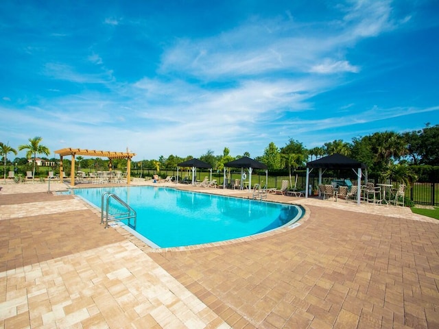 view of pool with a gazebo and a patio area