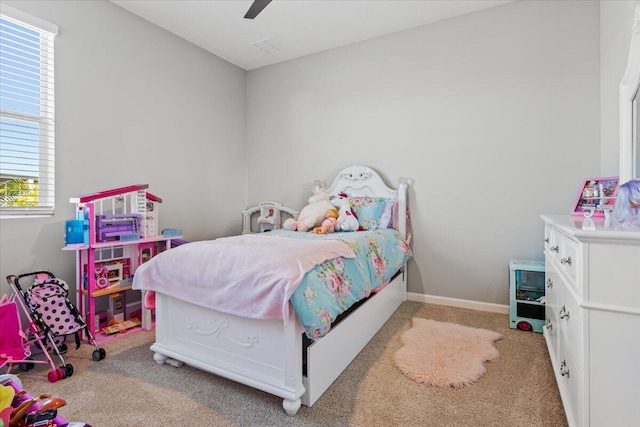 carpeted bedroom with ceiling fan