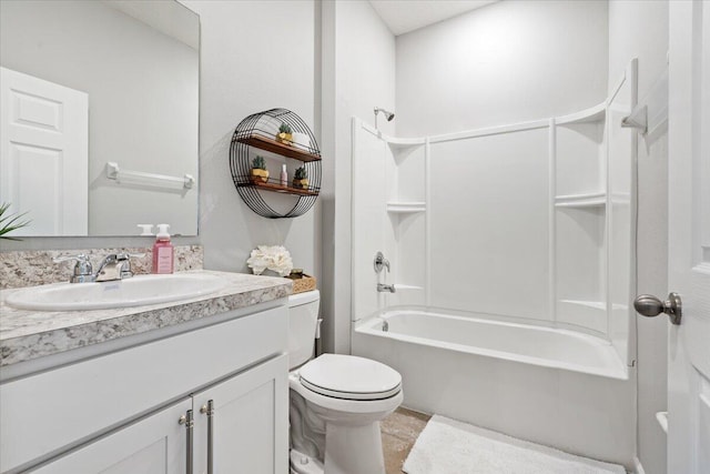 full bathroom with shower / tub combination, vanity, and toilet