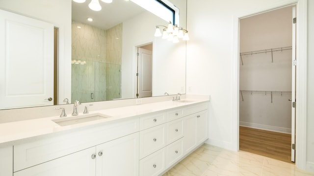 bathroom featuring vanity and walk in shower