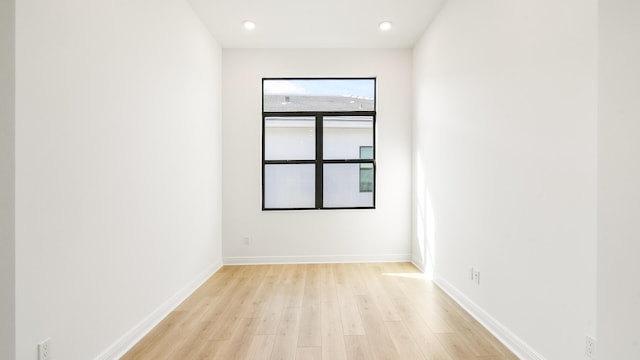 unfurnished room featuring light hardwood / wood-style floors