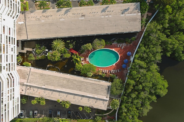 birds eye view of property featuring a water view