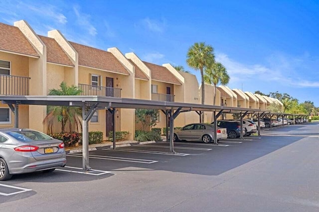 view of car parking featuring a carport